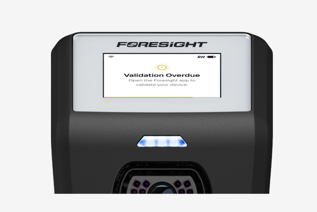 GC2 display showing a "Validation Overdue" warning: "Open the Foresight app to validate your device."