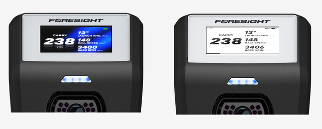 Two close-ups of the GC2 display showing the same shot data in indoor mode, darker screen, and outdoor mode, lighter screen. Left, indoor mode: white text on a dark blue background. Right, outdoor mode: black text on a white background. Both screens show Carry 238 yards, Launch Angle 13°, Ball Speed 148 mph and Back Spin of about 3,400 rpm, and the blue Status Light is on below the display in each.